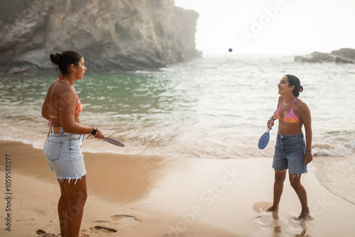 lgbtq+ couple having a fun day at the beach