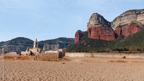 Sequía en el Pantano de Sau, embalse con capacidad al 16% de agua, deja a la vista toda la iglesia de Sant Roma de Sau . Cataluña, España. photo