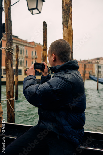 Man photographs the sights of Venice photo