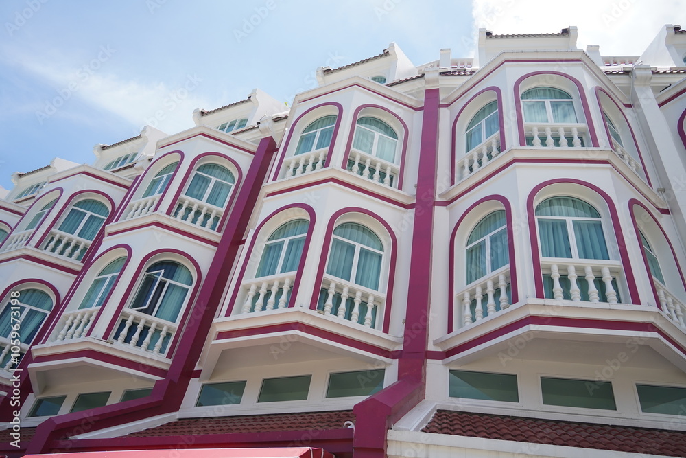 Obraz premium Detailed view of windows, doors and balconies of city buildings 
