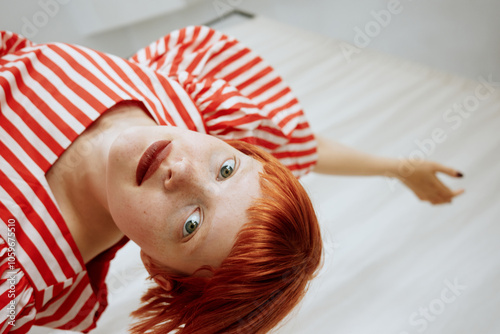 Low angle portrait of dancing woman photo