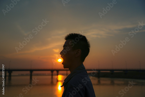 Hengsha Island, Shanghai - Young people at sunset photo