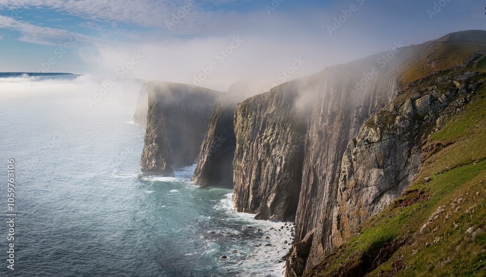 Dramatic sea cliffs in mist