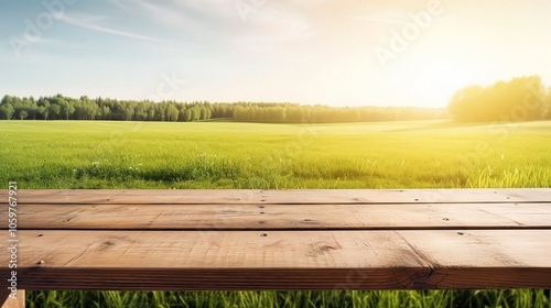 Wooden Table with Bright Summer Sky and Green Grass photo