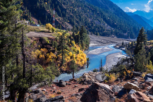 Mountain river in autumn. Miyar Valley is a remote and scenic valley located in the Western Himalayas, Himachal Pradesh. It is a part of the Lahaul Range, between Pir Panjal and Zanskar Range. photo