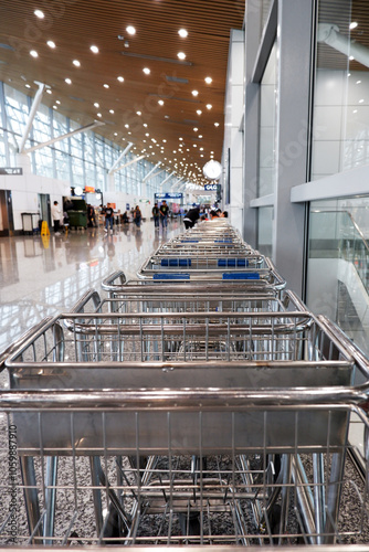 Photography a stack of luggage carts or luggage trolleys in the waiting area before boarding at KLIA T1, Kuala Lumpur International Airport Terminal 1