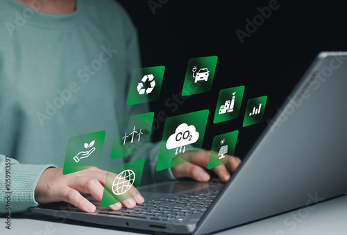 businessperson using laptop computers with ESG icon concepts for Environment, Social, Governance, net zero, carbon neutrality goals, development business sustainable environment concept. photo