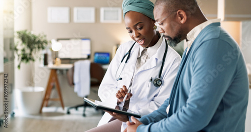 Tablet, patient and consultation with doctor for healthcare, insurance or exam results. African people, technology and medical professional explain treatment for wellness, checkup and help in clinic photo