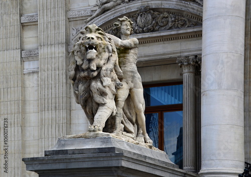 Sculpture at the Historical Stock Exchange in Downtown Brussels, the Capital of Belgium photo