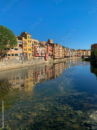 colorful houses at river Onyar in Girona, Catalonia, Spain #1060135124