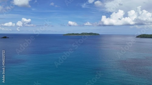 Mesmerizing Drone View Over Calm Sea with Distant Islands on the Horizon in the Philippines – Captured in Stunning 4K on a Sunny Day