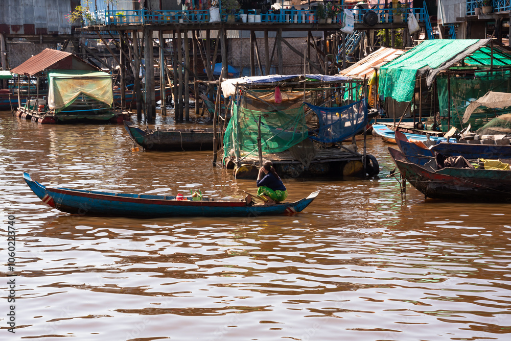 Floating village in Cambodia with traditional wooden houses Floating village in Cambodia with traditional wooden houses