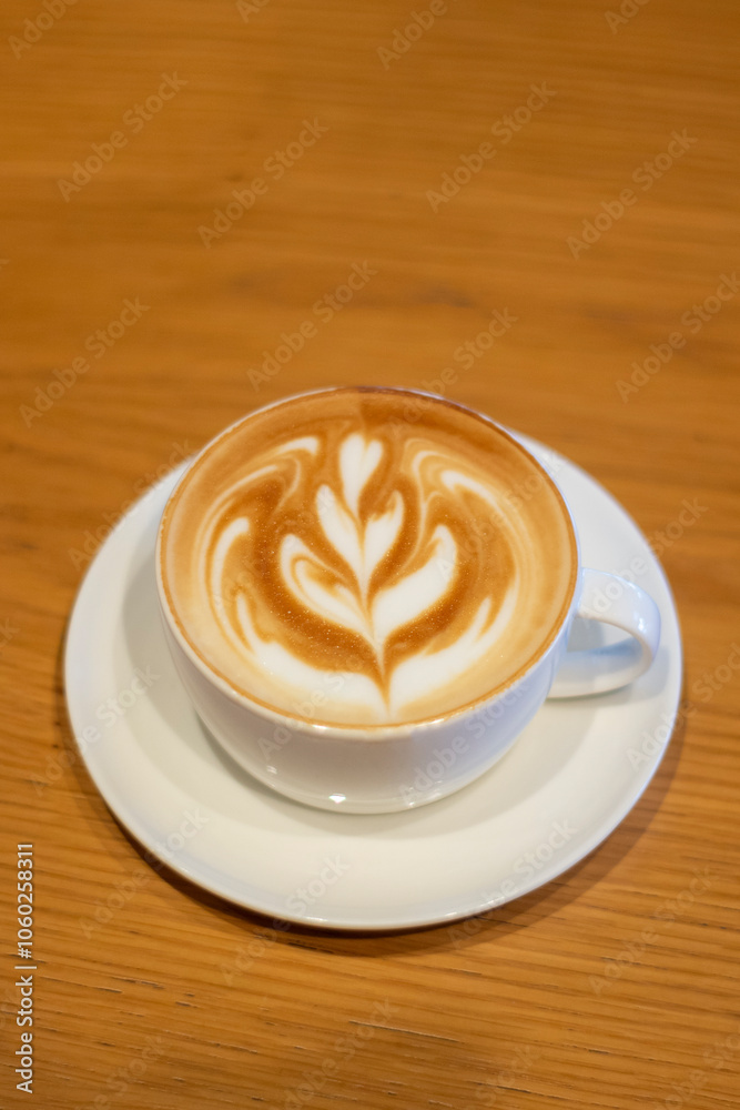 Coffee cup on a wooden table Coffee cup on a wooden table
