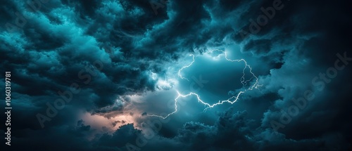 Wallpaper Mural Dramatic thunderstorm clouds illuminate a dark valley with flashes of lightning against a moody sky at dusk Torontodigital.ca