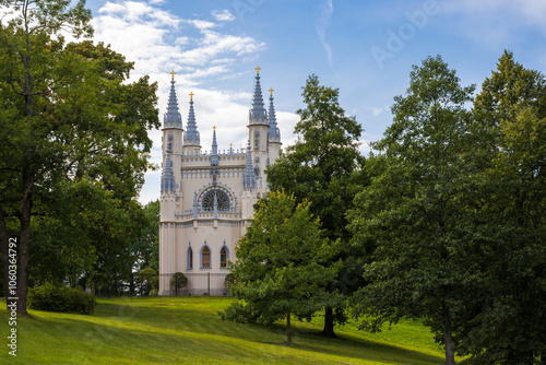 Church of St. Alexander Nevsky (Gothic Chapel) in Alexandria Park in Peterhof. An Orthodox church built in 1831-1834. Historical and architectural landmark of Peterhof. Saint Petersburg, Russia. photo