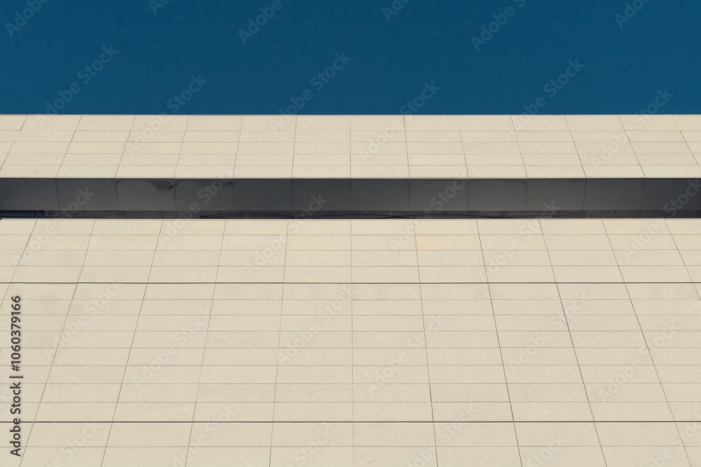 Abstract architecture. Close up of a building facade with blue sky. Abstract architecture. Close up of a building facade with blue sky.