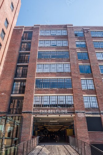 The glass windows reveal a glimpse of the city's bustling heartbeat within, Ponce City Market, Atlanta, Georgia, United States of America