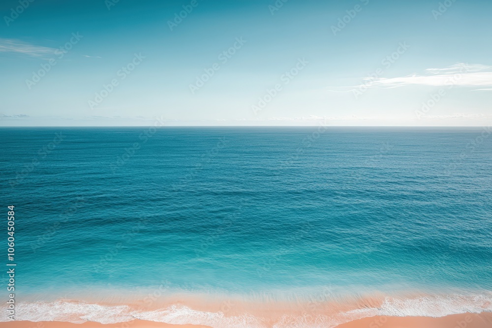 Fototapeta premium A serene sunset scene over the ocean on a cloudy day, perfect for travel or nature-themed projects. Beautiful simple AI generated image
