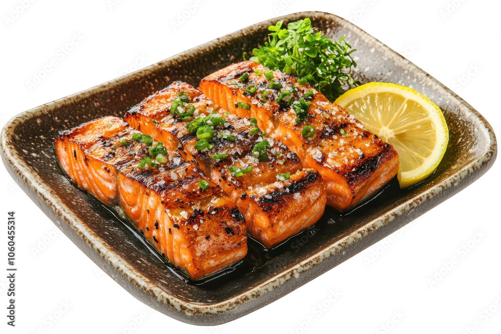 Grilled salted salmon shioyaki with lemon wedge, PNG isolated on transparent background, white background. Grilled salted salmon shioyaki with lemon wedge, PNG isolated on transparent background, white background.