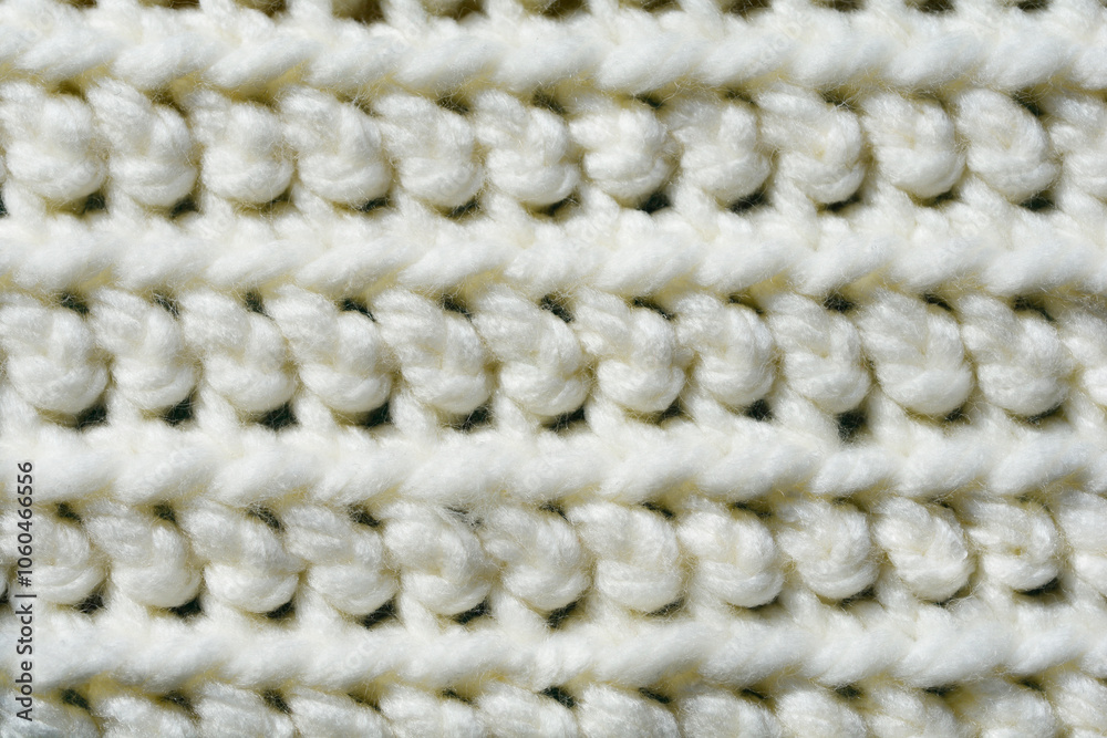 Close-up of extra thick crochet fabric in white color Close-up of extra thick crochet fabric in white color