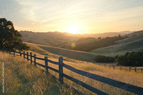 Serene Sunrise Over Rolling Hills with Wooden Fence