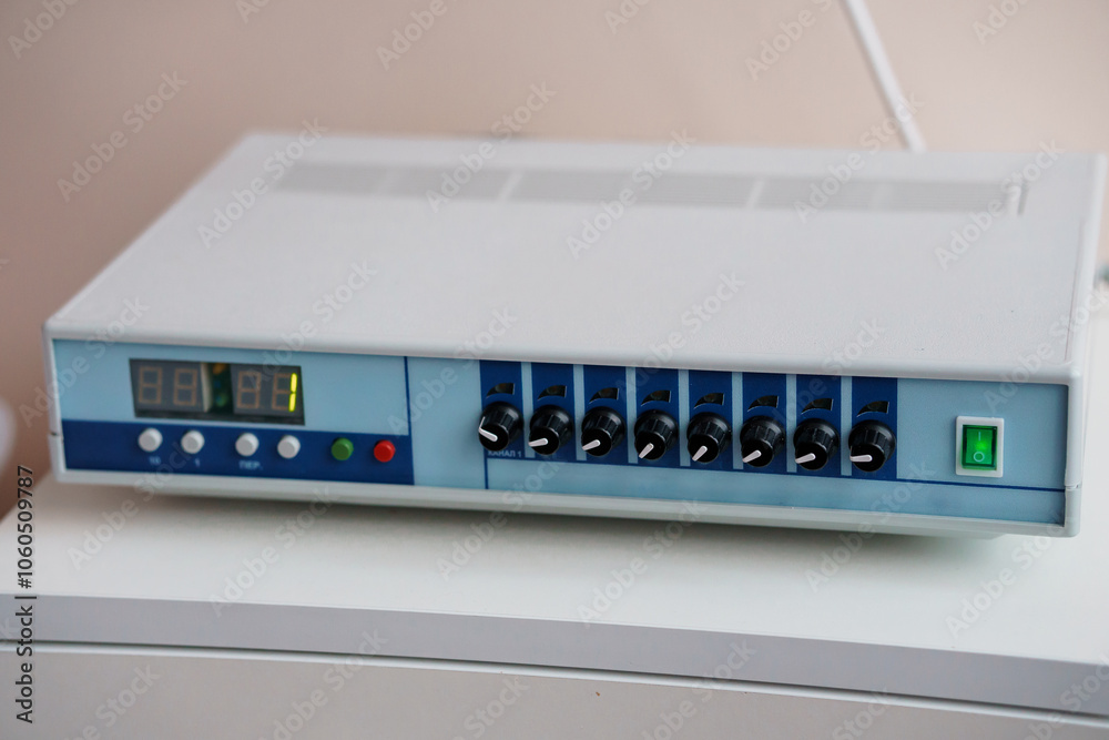 Modern Multipurpose Audio Control Unit with Digital Display and Multiple Knobs