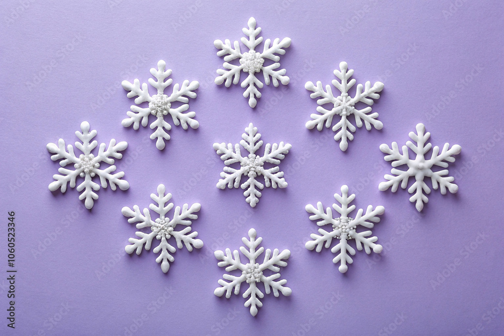 White Snowflakes on a Lavender Background for Christmas and New Year White Snowflakes on a Lavender Background for Christmas and New Year