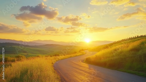 Magical sunset and rural landscape view of Picturesque agrotourism with characterized green top hill farms of olive groves and vineyards typical curved road with cypress at Crete Senesi in Toscana, It