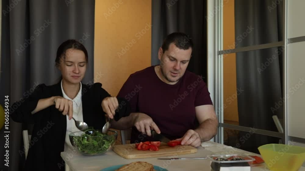 Father and daughter preparing food, cozy dinner preparation, healthy eating together Father and daughter preparing food, cozy dinner preparation, healthy eating together