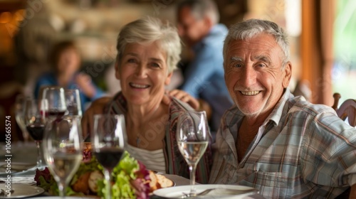 Happy multi-generation family gathering around dining table and having fun during a lunch or dinner on holiday or weekend, senior couple, grandparents, grandmother and grandfather eating