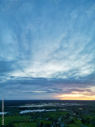 High Angle View of Harefield Town London, Uxbridge, England, United Kingdom During Sunset. Aerial Footage Was Captured with Drone's Camera from Medium High Altitude on April 3rd, 2024 photo