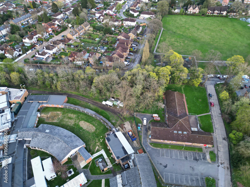 High Angle View of Harefield Town London, Uxbridge, England, United Kingdom During Sunset. Aerial Footage Was Captured with Drone's Camera from Medium High Altitude on April 3rd, 2024 photo