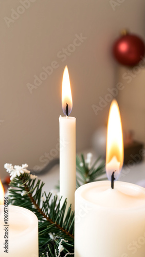 three burning candles a festive setting