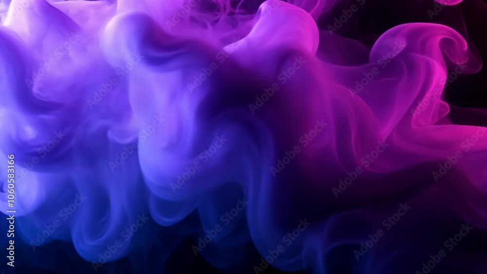 Purple and blue smoke swirl together against a black background