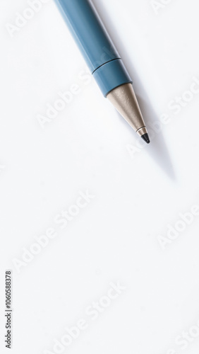 blue pen on a white surface