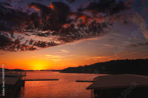 Sunrise over the marina at the Lake of the Ozarks with a dramatic cloudscape in Missouri, USA