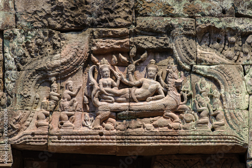 Wonderful lintel of ancient Narai Banthomsin on monster naga and dragon in the sea of Preah Khan temple, Siem Reap, Cambodia. photo