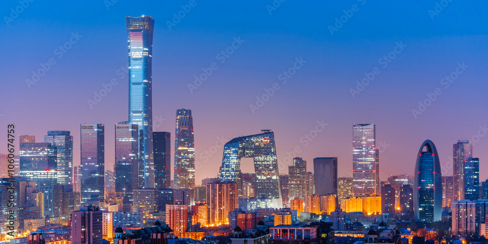 Obraz premium High angle night view of the Beijing Guomao CBD architectural complex in China