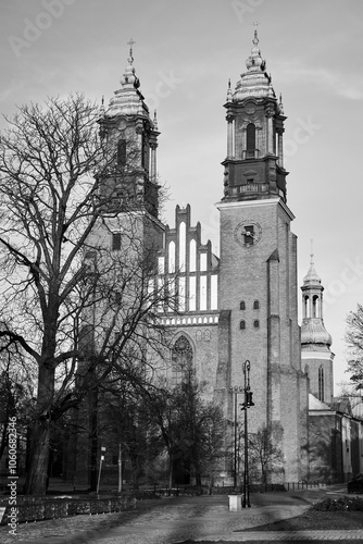 facade and towers of the gothic, historic cathedral in the city of Poznan