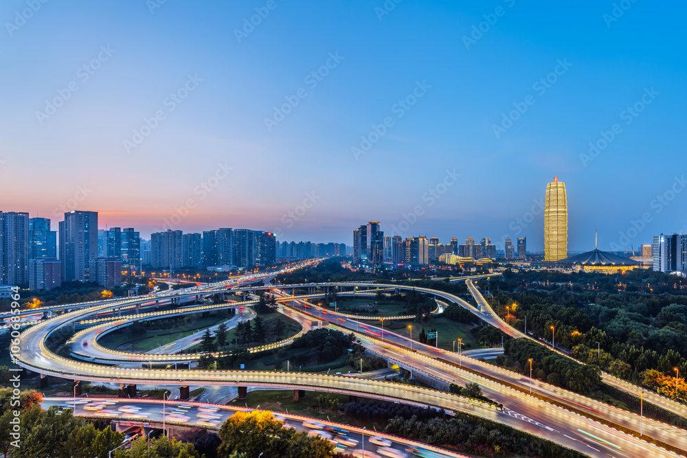Fototapeta premium Night view of CBD and overpass in Zhengdong New District, Zhengzhou, Henan Province, China