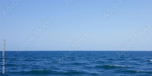 Beautiful ocean background with crystal clear blue waters, gentle waves, and a distant horizon, sea, nature