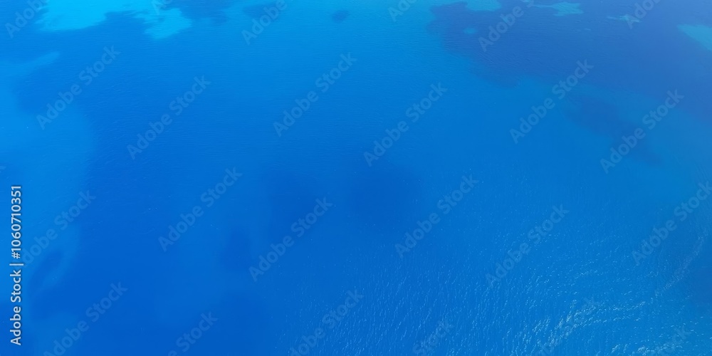 Obraz premium A stunning aerial view of crystal clear blue waters of the ocean, surrounded by lush tropical islands, vacation, aerial view