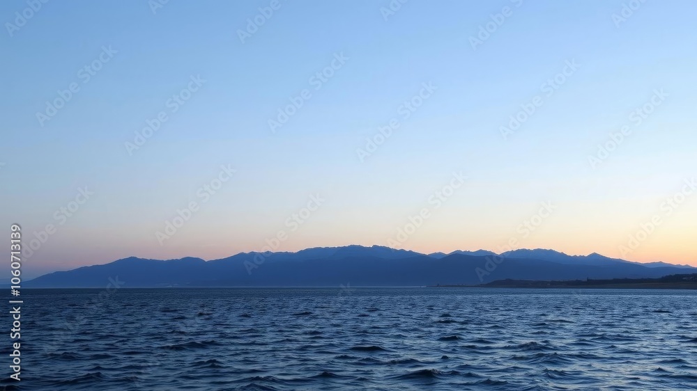 A serene lake reflecting the surrounding mountains at sunset, peacefulness, beauty A serene lake reflecting the surrounding mountains at sunset, peacefulness, beauty