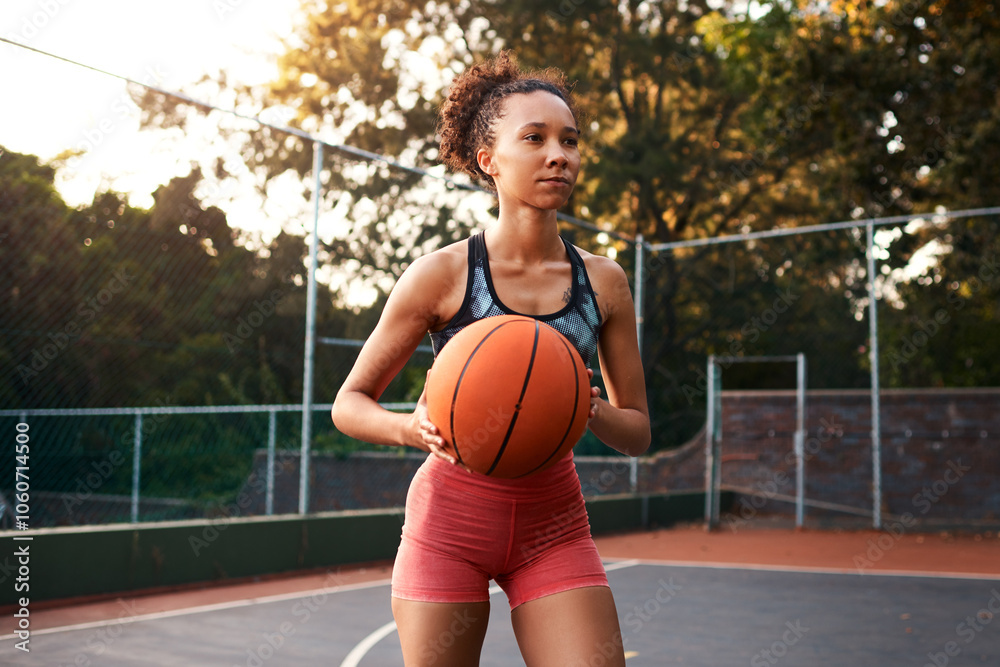 Girl, sports and ball on basketball court as ready for training as player or athlete for challenge. Female person, warm up and outdoor for competition, match and game in physical activity or exercise Girl, sports and ball on basketball court as ready for training as player or athlete for challenge. Female person, warm up and outdoor for competition, match and game in physical activity or exercise