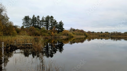 Obraz na płótnie lakeside landscape scenery, jetty at Ballyqiurke lough, Moycullen, Galway, Ireland, nature background w salonie