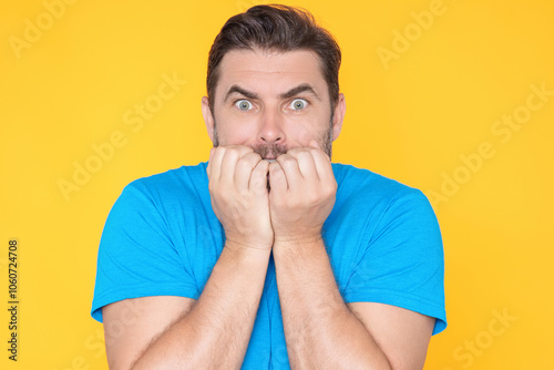 Portrait of shocked unshaven caucasian man afraid and shocked with surprise expression, fear and excited face. Emotion people. Shocked man with great disbelief, expresses surprisment and astonishment. photo