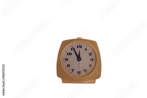 Old alarm clock on a white background.