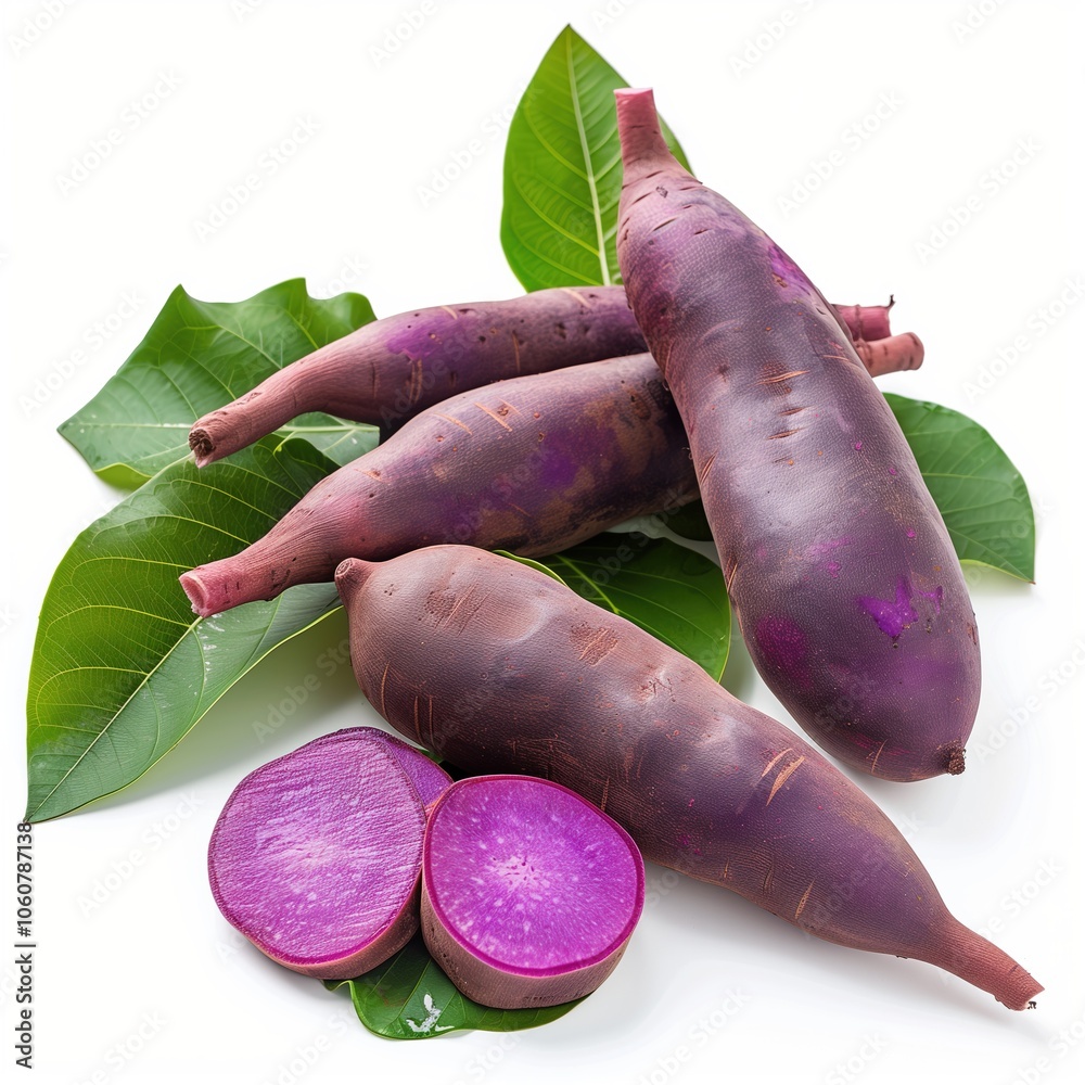 Group of purple Yams with Green leaves isolated on white background, ripe tropical natural fruit concept Group of purple Yams with Green leaves isolated on white background, ripe tropical natural fruit concept