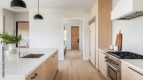 Openconcept bamboo kitchen  large island with bamboo finish  pendant lights  warm tones  sustainable kitchen design