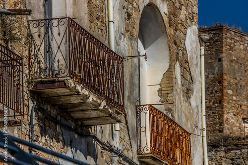 Abandoned ruins of the ghost town of Craco. A city abandoned due to an earthquake in the late 20th century. Province of Matera, Basilicata, Italy photo